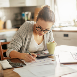 Young woman working on her finances.