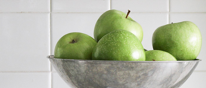 Green apples in a bowl