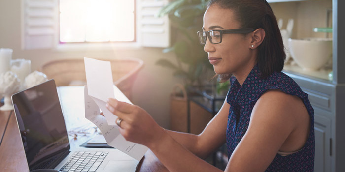 Woman working on her finances. 