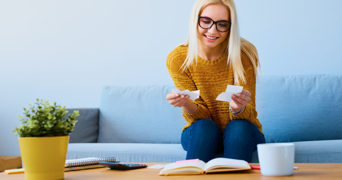 Young woman working on her budget.